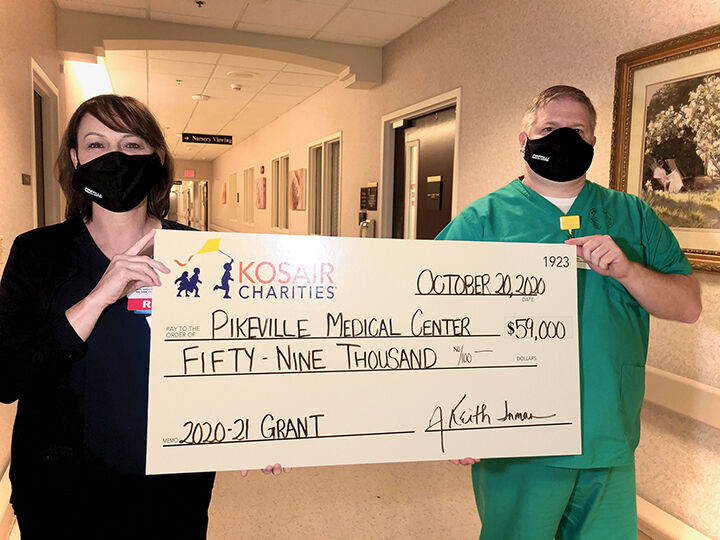 10-27 PMC-Kosair check.jpg